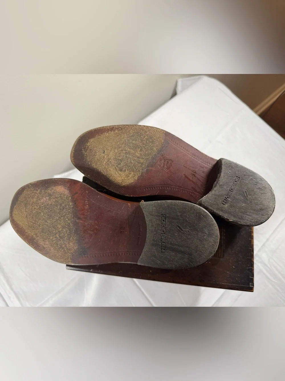Giorgio Brutini brown leather slip-on loafers featuring a woven design
